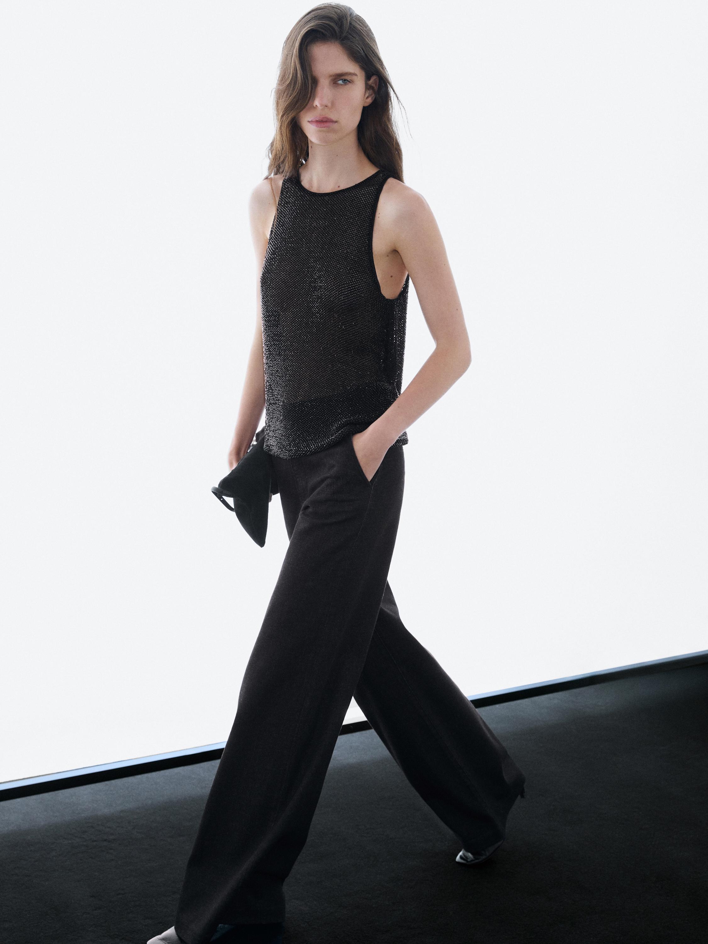 Semi-sheer top with matching beads